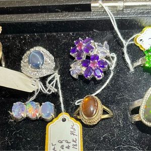 12 sterling silver rings.